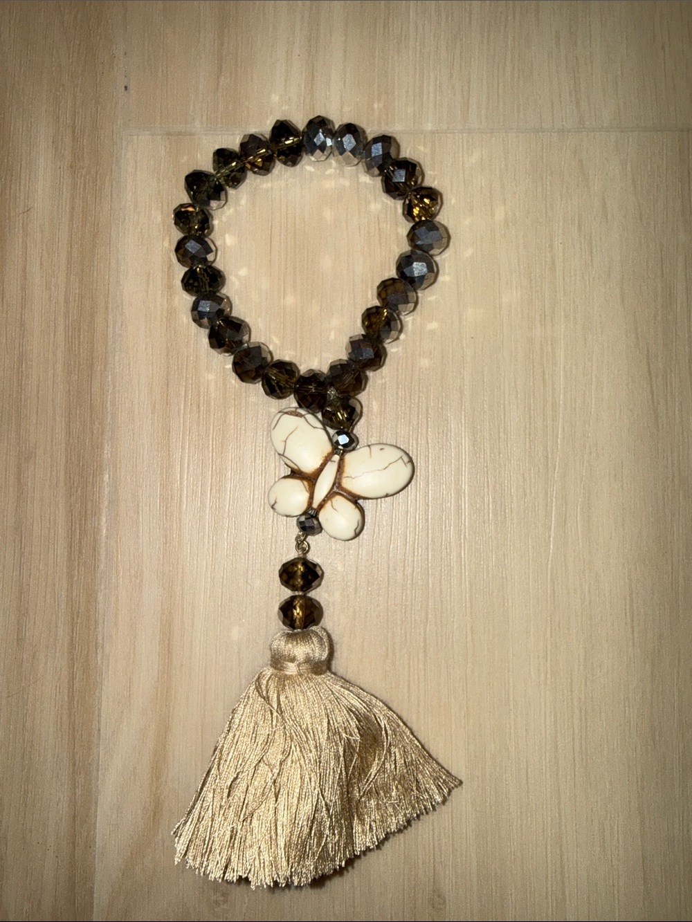 Beaded Bracelet with White Stone butterfly and Beige Tassel